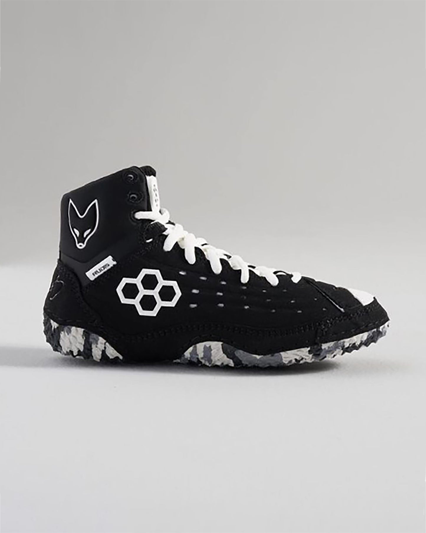 A stylish black high-top athletic shoe featuring a hexagonal logo white laces and a textured sole designed for traction