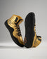 A pair of stylish golden high-top athletic shoes featuring a black sole intricate detailing and laces for a secure fit