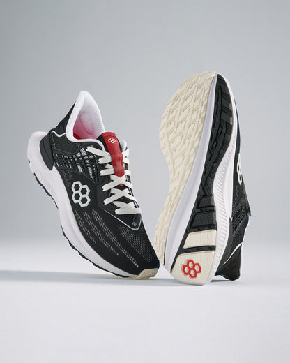 A pair of modern black and white running shoes featuring a breathable mesh upper and unique design elements for performance and style