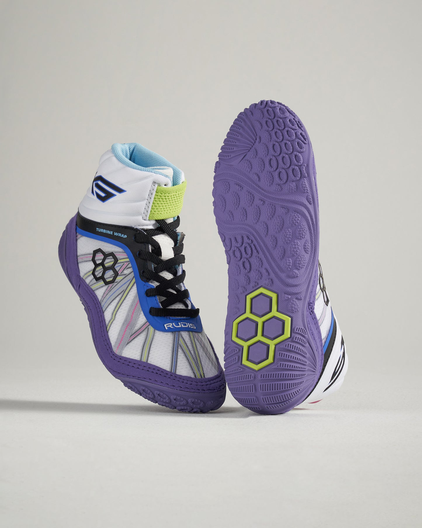 This image features a pair of vibrant high-top sports shoes designed for wrestling showcasing a unique combination of colors and advanced grip technology