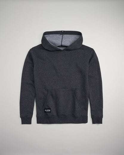 A dark gray pullover hoodie with a front pocket and a soft interior lining featuring a logo tag on the hem