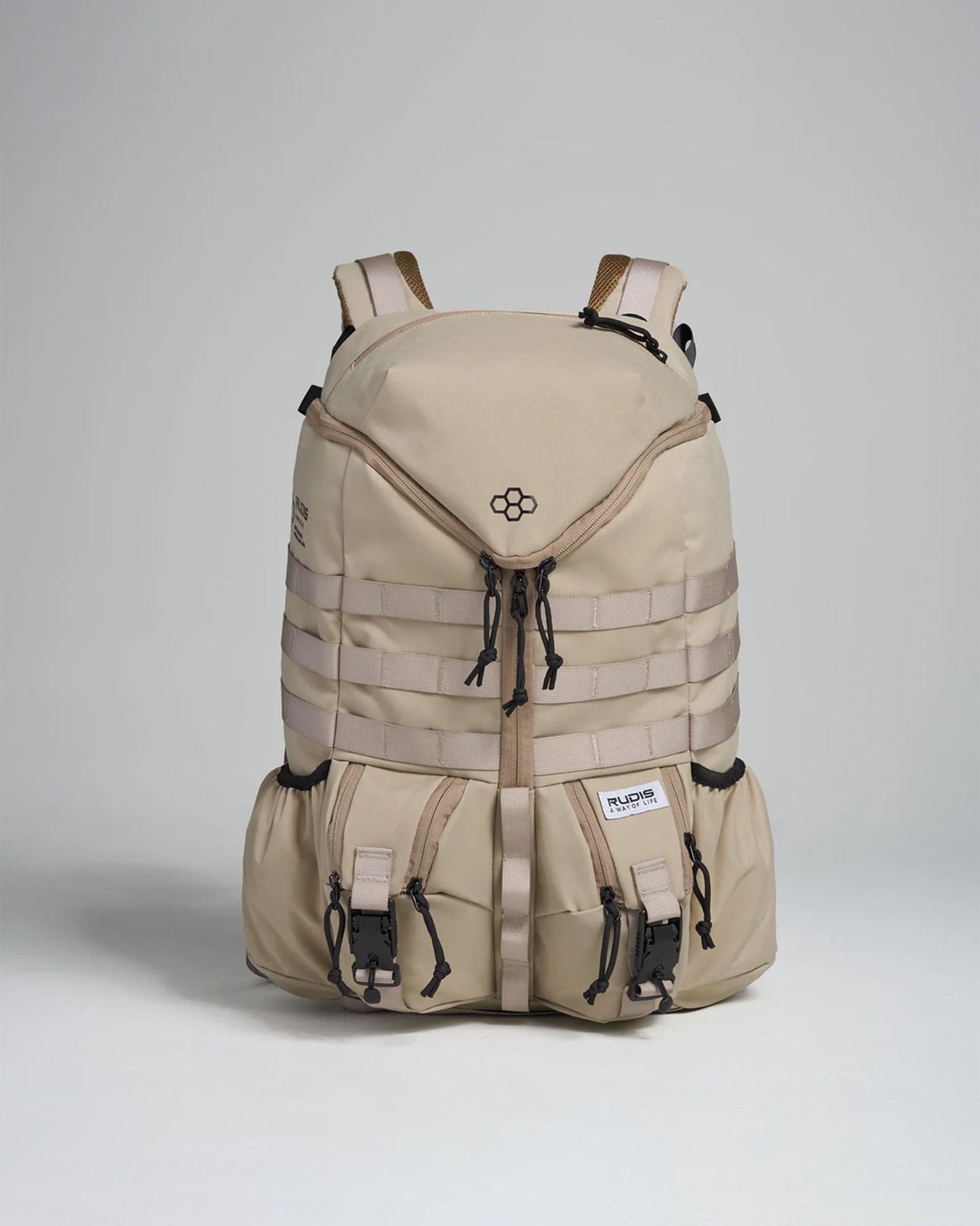 A modern beige backpack designed for functionality and style featuring various compartments and adjustable straps